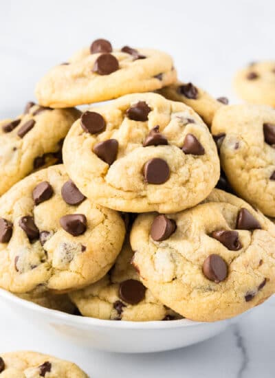 A pile of chocolate chip pudding cookies in a bowl.
