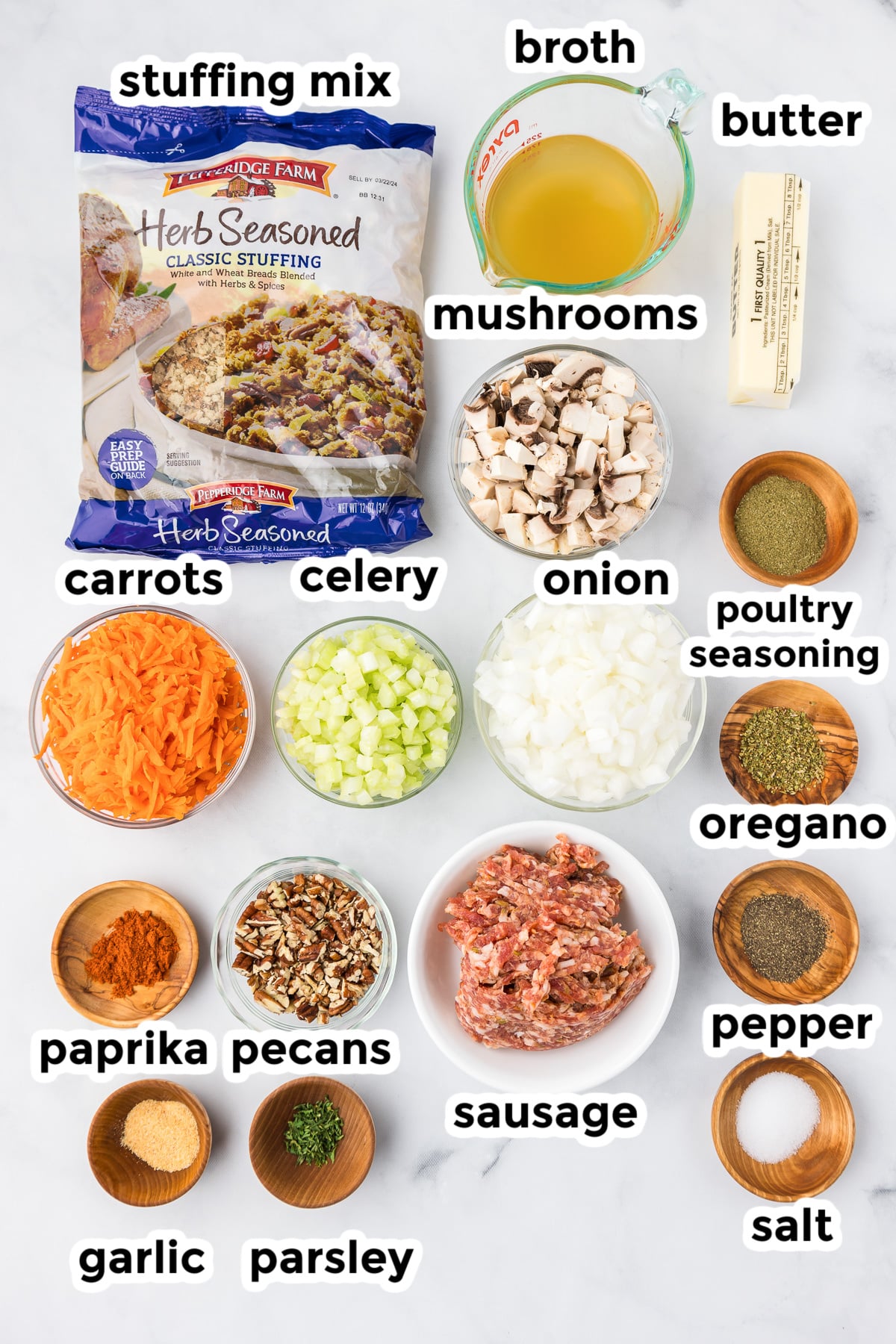 Ingredients for sausage stuffing in bowls from above with text labels.