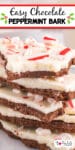 Easy chocolate peppermint bark stacked tall with the top piece missing a bite and title text overlay on top of the image.