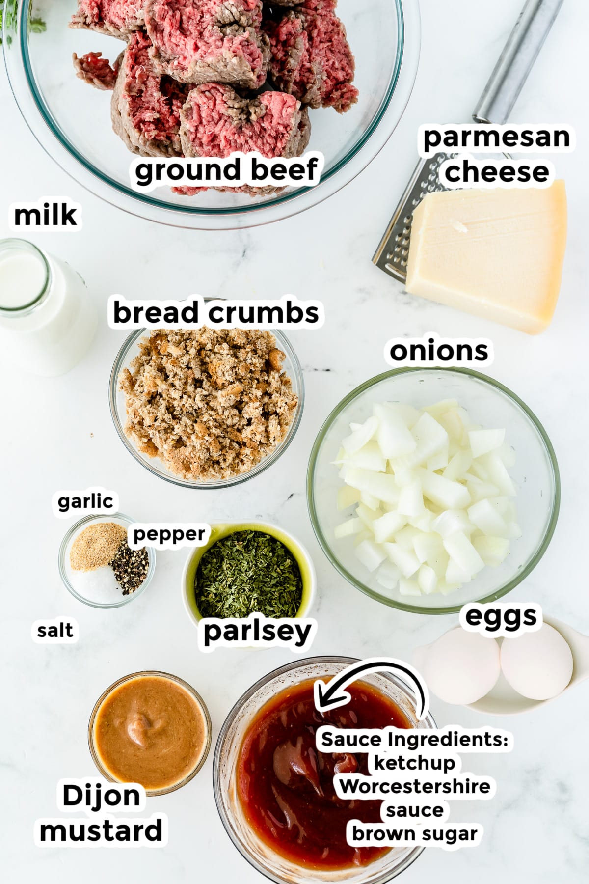 Ingredients for mom's meatloaf in bowls with text labels over top of the image.