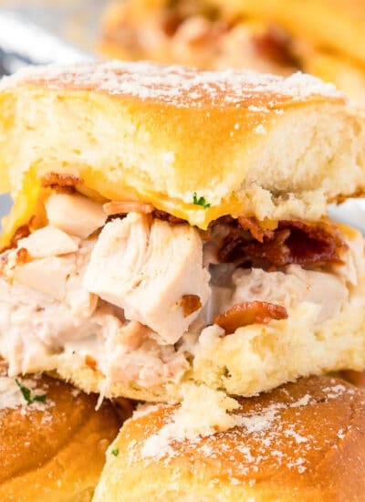 Close-up of a chicken bacon ranch slider sandwich.