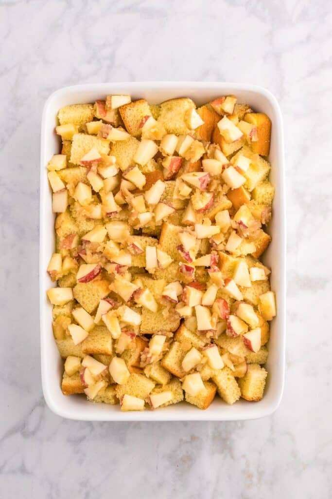 Apple french toast casserole after adding the appe cinnamon mixture before baking.