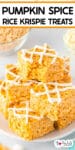 A stack of pumpkin spice Rice Krispie treats drizzled with white chocolate on a plate with the top piece missing a bite and title text across the top.