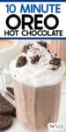 A glass mug filled with Oreo hot chocolate topped with whipped cream and crushed Oreo pieces with title text over the image.