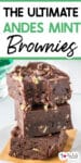 Stack of three chocolate Andes mint brownies with Andes mint pieces with the top piece missing a bite and title text across the top of the image.