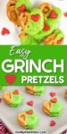 Grinch pretzels dipped in green chocolate with red heart decorations both from above up close and on a baking sheet with title text between the images.