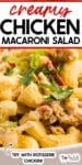 Close-up of creamy chicken macaroni salad with pasta, chicken, red peppers, and green herbs, with text suggesting to try with rotisserie chicken.