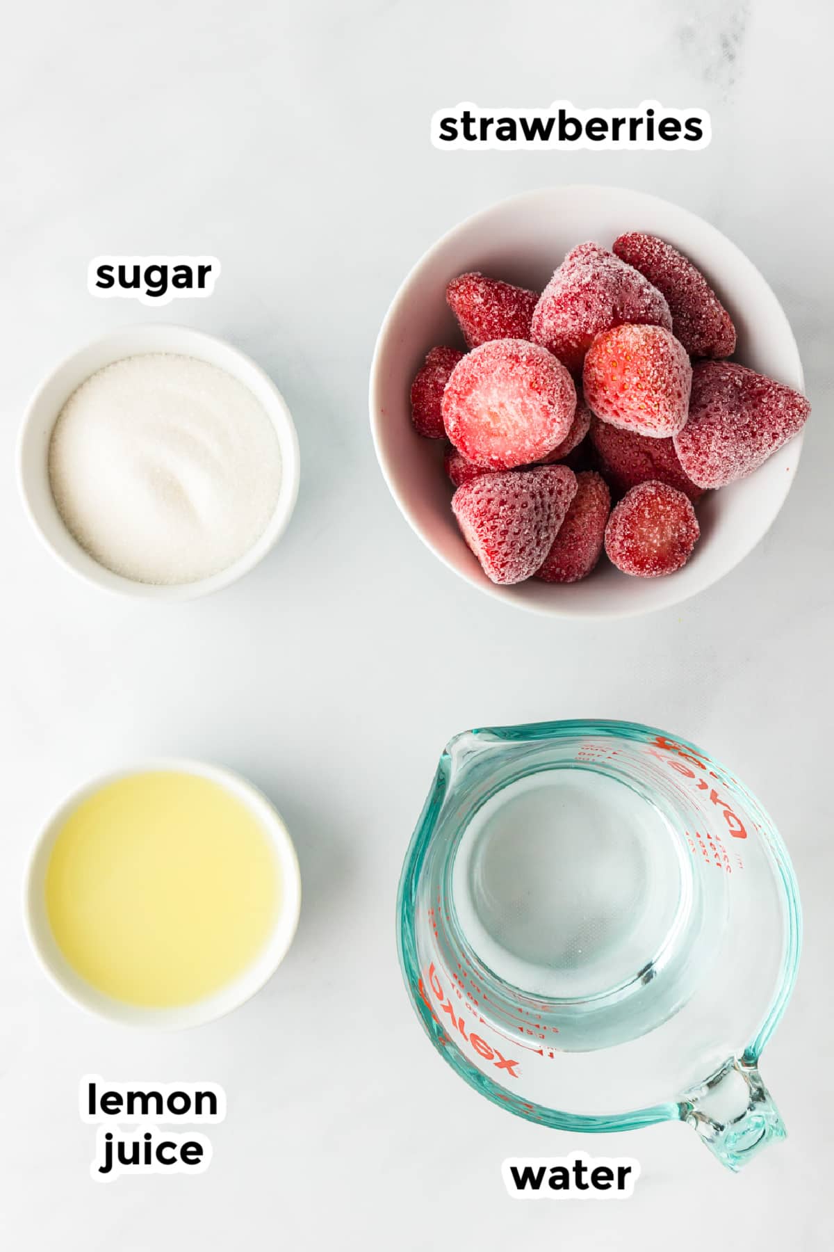 Ingredients for frozen strawberry lemonade in bowls with text labels.