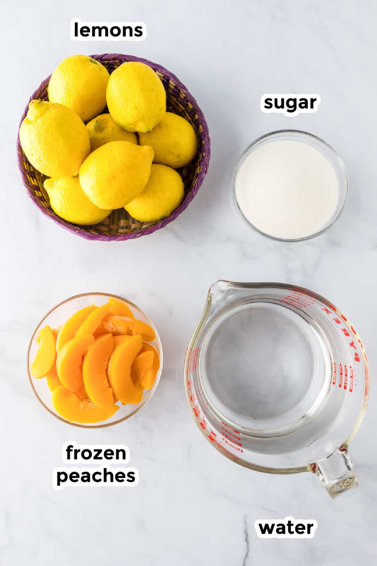 Ingredients for peach lemonade on the counter with text titles.
