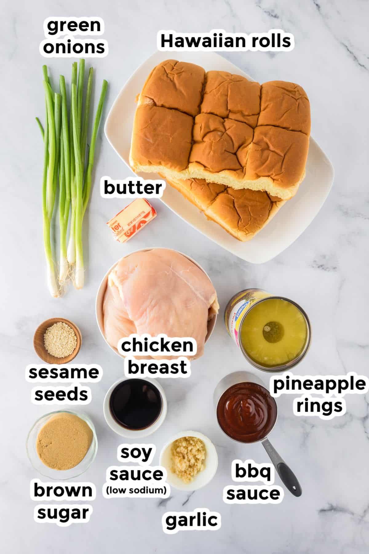 Top-down view of ingredients for Slow Cooker BBQ Hawaiian Roll Chicken Sliders with labels.