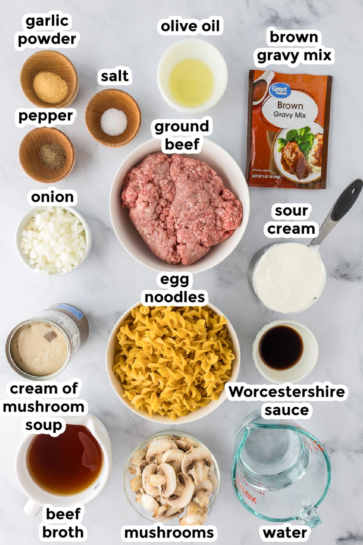 Ingredients for ground beef stroganoff laid on a counter.