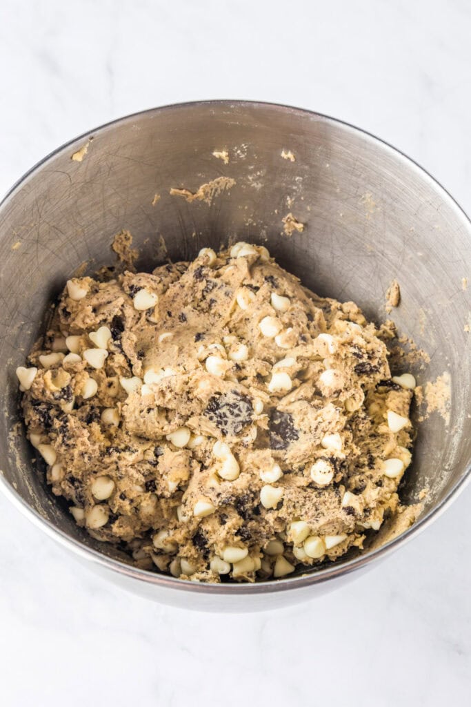 A bowl of cookie dough mixed and ready to bake into delicious Oreo pudding cookies.