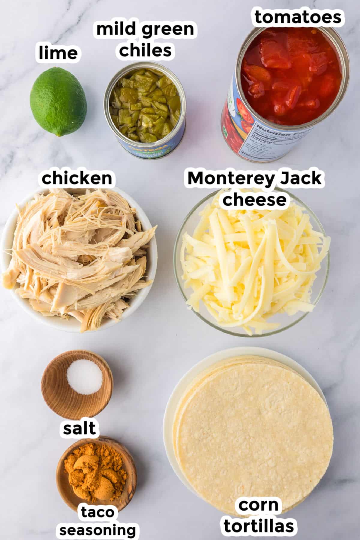 Ingredients for a crispy baked chicken tacos on a counter with text labels.